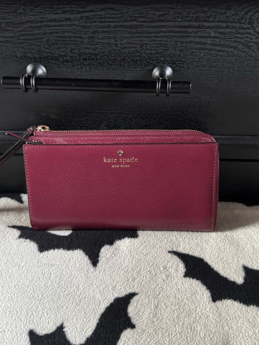 kate spade Plum Zip-Around Leather Wallet with Gold Logo